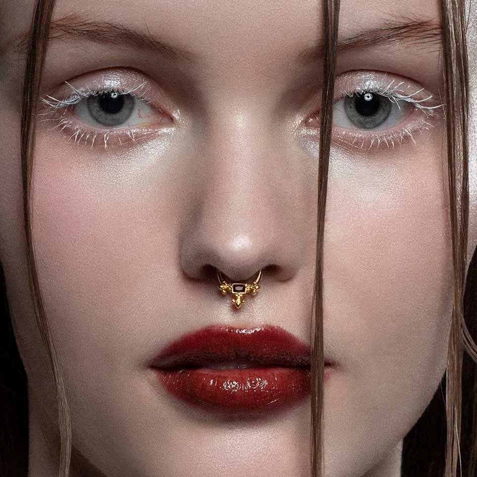 MUTINY. Medieval Garnet Septum Clicker Ring - Gold